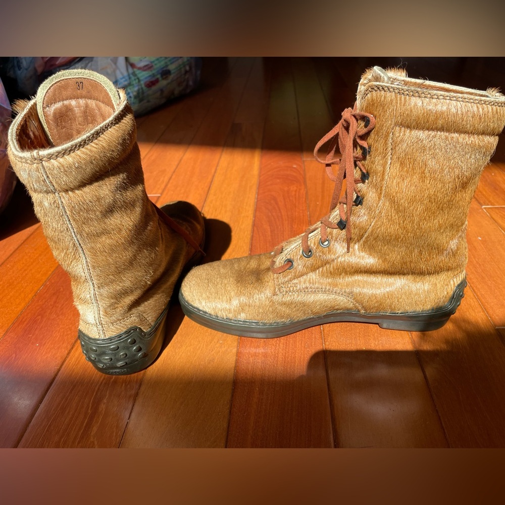 Tod’s Italian leather and calf hair boots.